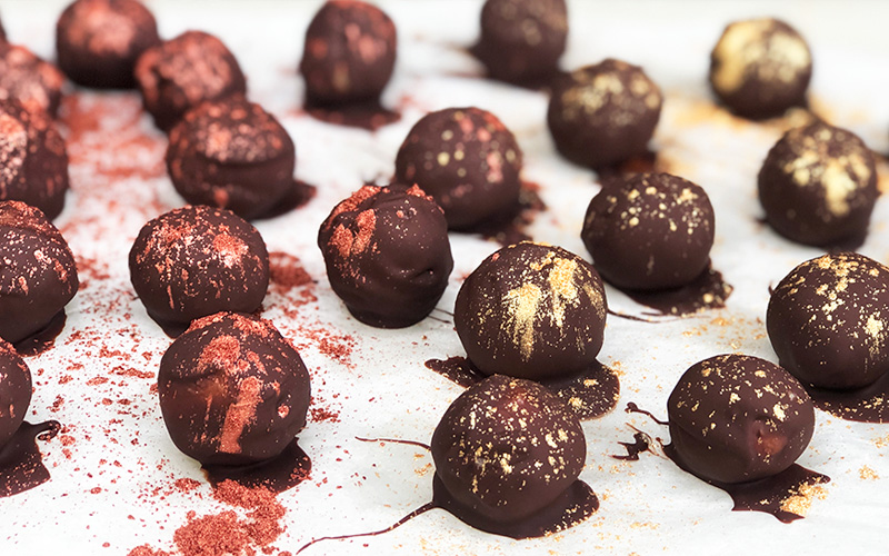 Cashewkuler trukket i mørk sjokolade